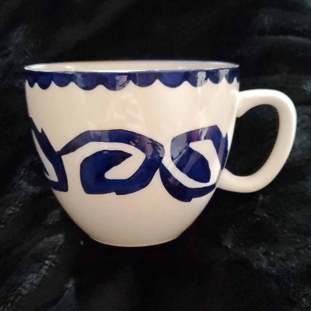 4 mugs by Baum
